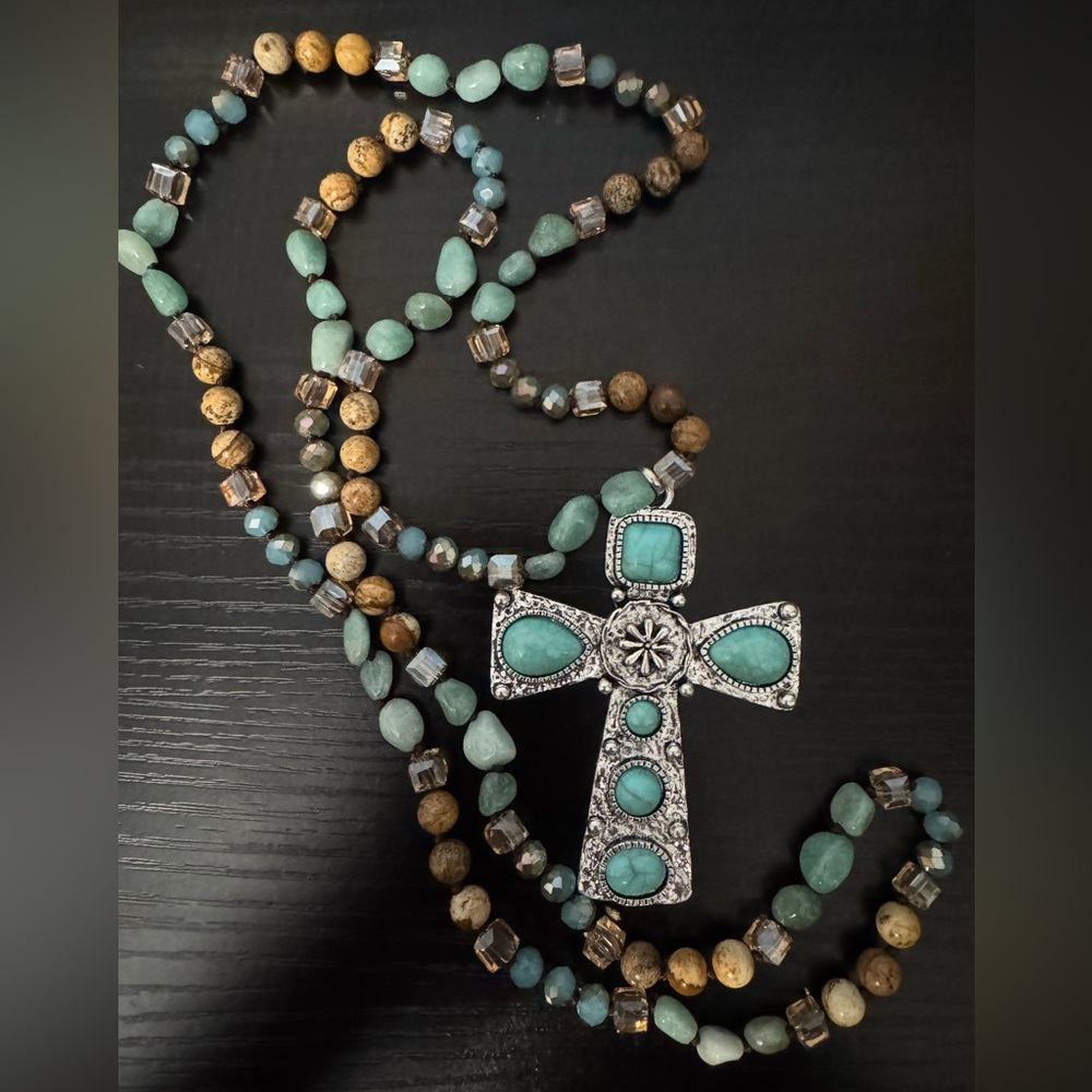 Long boho-style beaded necklace.